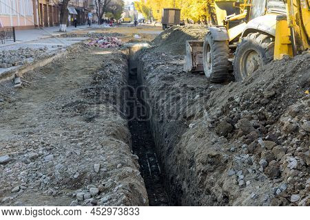 Laying Drainage Pipes Into The Ground Of Underground Drainage Works