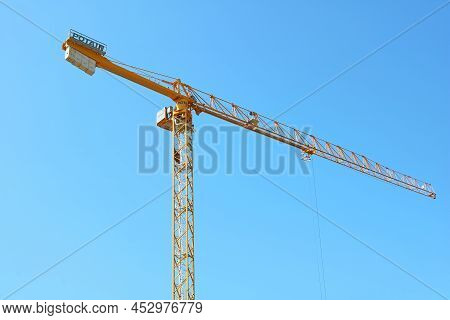 Tel Aviv, Israel - September 17, 2017: Modern, Yellow Construction Crane, With An Operator Cabin, Ma