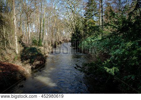 River De Dijle Running Through The Park In Leuven
