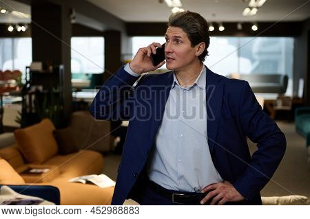 Portrait Of A Confident Businessman, Entrepreneur, Successful Sales Manager, Retail Assistant, Inter