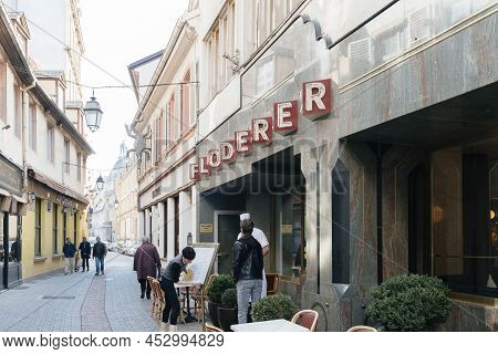 Strasbourg, France - Apr 11, 2022: Floderer Signage Above The Iconic French Restaurant With Chief Ta