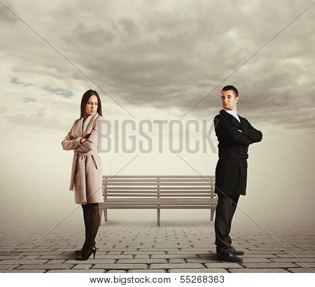 sorrowful couple in quarrel