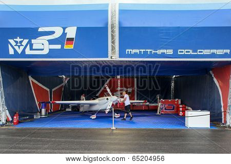 PUTRAJAYA, MALAYSIA - MAY 17, 2014: The Edge 540 V3 plane of Matthias Dolderer of Germany parks at the hangar during the Red Bull Air Race World Championship 2014 in Putrajaya, Malaysia.