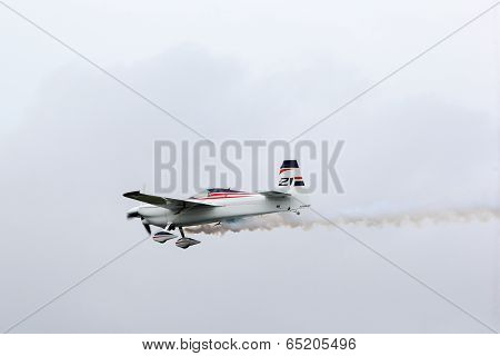 PUTRAJAYA, MALAYSIA - MAY 17, 2014: Matthias Dolderer from Germany, flying an Edge 540 v3 plane takes to the skies at the qualifying session of the Red Bull Air Race World Championship Putrajaya 2014.