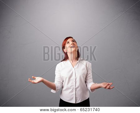 beautiful young lady standing and juggling with copy space
