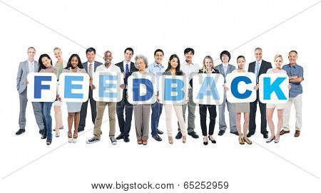 Group Of Happy Multi-Ethnic Business People Holding The Word Feedback 