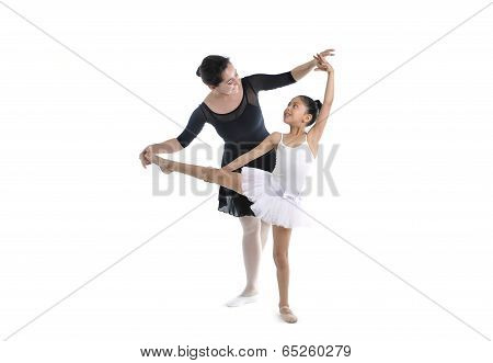 Young Little Girl Ballerina Learning Dance Lesson With Ballet Teacher