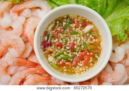 biol shrimps with seafood sauce on white plate