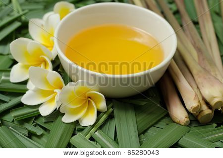 Citronella Grass And Oil On Citronella Grass Leave Background