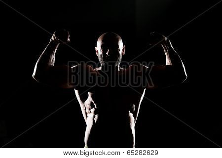 Siluet Muscular Man Flexing Muscles