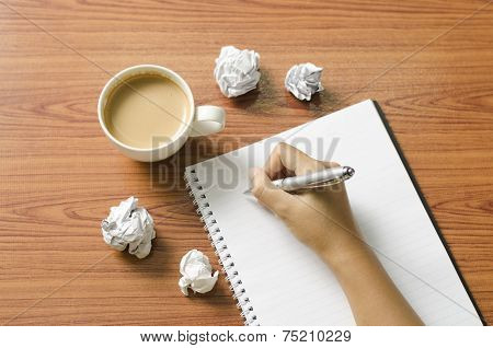 Hand Writing With Pen On Notebook