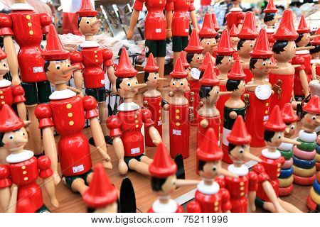 Painted Wooden Souvenir Dolls Of The Figure Of Pinocchio