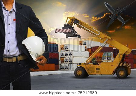 Engineering Man And Safety Helmet Working In Container Dock Use For Port Logistic And Transportation