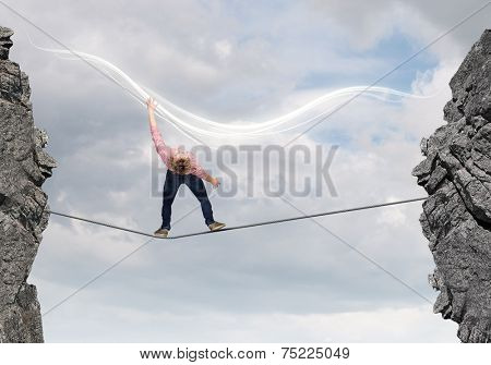 Young guy in casual evading from light rays