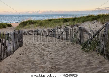 Wooden fence with Atlantic ocean early morning near Provincetown in Cape Cod , Massachussets, USA