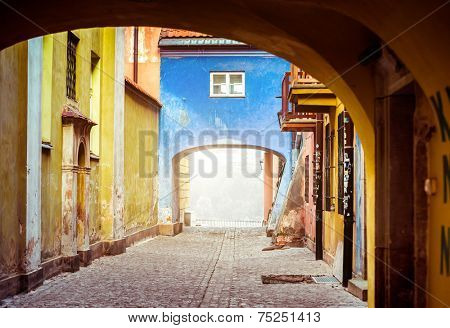 Little parasite home bridge on narrow Dawna street in Warsaw, Poland