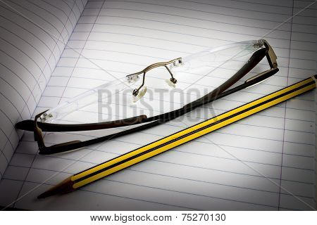 Blank Notebook With Pencil And Glasses