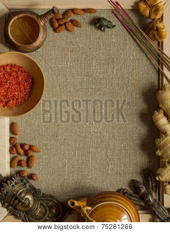 Indian figurines, nuts, saffron and incense with a copy space