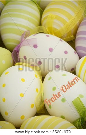frohe ostern against easter eggs nestled together
