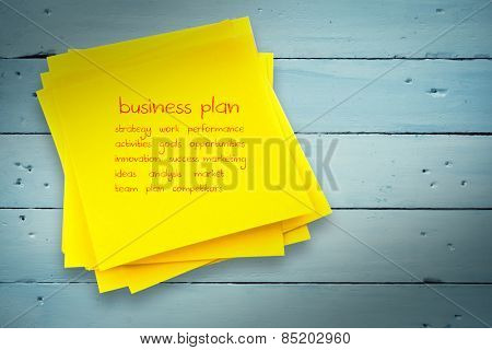 Business plan against sticky note