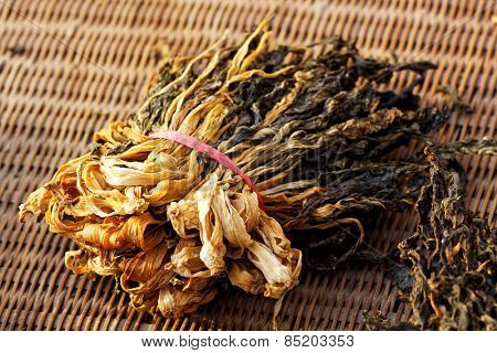 Chinese dried white cabbage on bamboo background