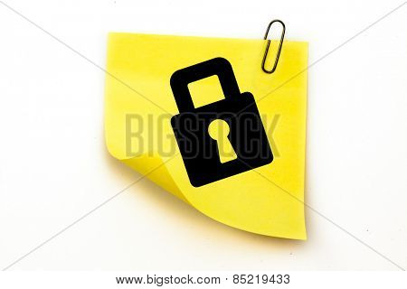 Lock against sticky note with grey paperclip