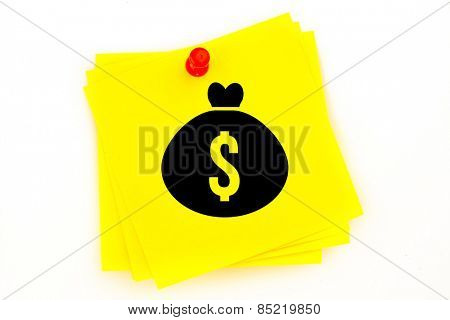 Money bag against sticky note with red pushpin