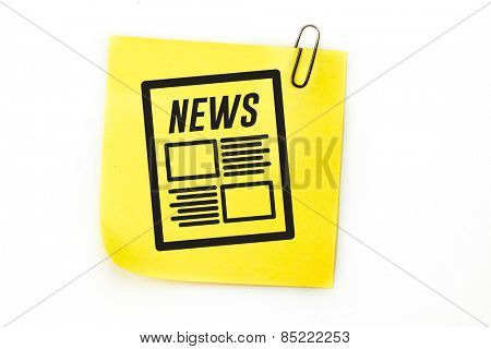 Newspaper against sticky note with grey paperclip