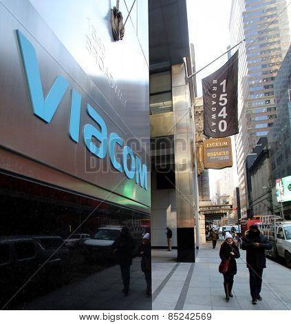 NEW YORK CITY - FEB. 25, 2015:  A pedestrian walks past the headquarters of Viacom. Viacom, Inc. is an American global mass media company

