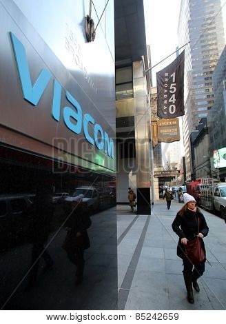NEW YORK CITY - FEB. 25, 2015:  A pedestrian walks past the headquarters of Viacom. Viacom, Inc. is an American global mass media company


