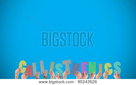 Hands holding up callisthenics against blue background with vignette