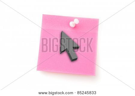 Arrow against pink adhesive note with pushpin