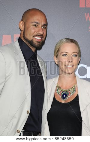 LOS ANGELES - MAR 11:  Hank Baskett, Kendra Wilkinson at the 