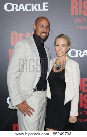 LOS ANGELES - MAR 11:  Hank Baskett, Kendra Wilkinson at the 
