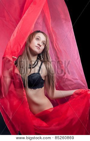 Young pretty woman in black lingerie