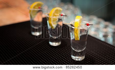 Three Tequila Shots With Lemon