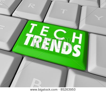 Top Trends words on a green computer keyboard button to illustrate top, best or most popular modern computer programs, software, hardware or devices