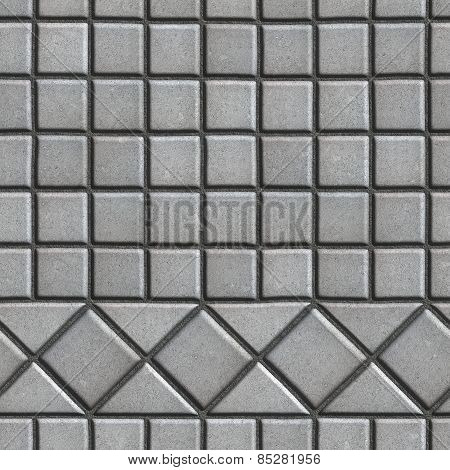 Grey Pave Slabs in the Form of Small Squares and Triangles.