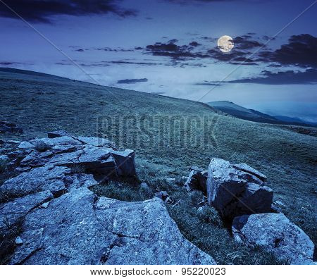 White Boulders On The Hillside At Night