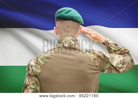 National Military Forces With Flag On Background Conceptual Series - Lesotho