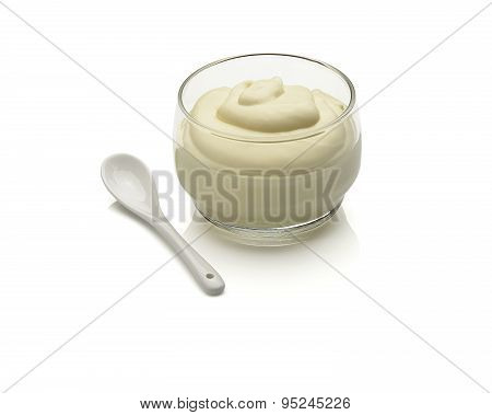 jar of mayonnaise and spoon on white background