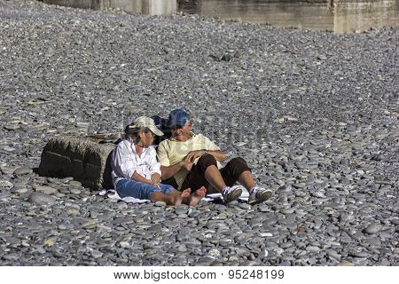 Senior Couple Relaxing In Camogli, Italy