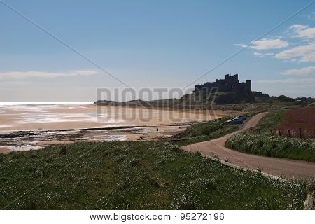 Bamburgh Castle and beech with tide out