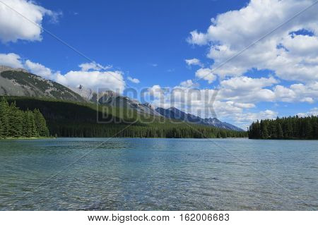 Photography: Beautiful landscape with a lake and clouds. Banff, Alberta, Canada.