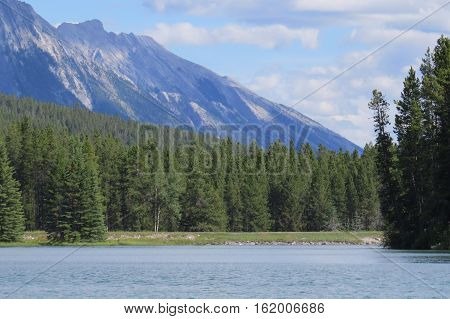 Photography: Beautiful landscape with a lake and clouds. Banff, Alberta, Canada.