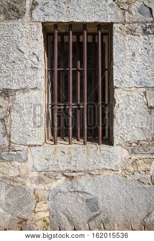 Old Stone Jail House Window with bars