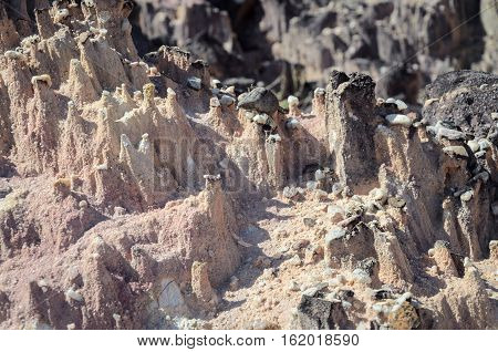 Formations Made By Rainwater On Sandy Rocks. The Rainwater Hits The Stone's Edge Forming These Point
