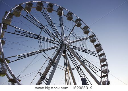Ferris wheel  under the evening sky in England