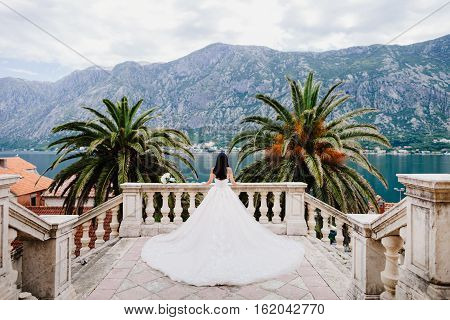 Bride In Wedding Dress In Beautiful Location