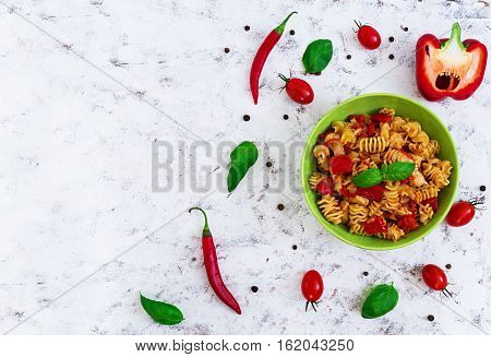 Radiatori Pasta With Chicken And Peppers On White Background. Top View